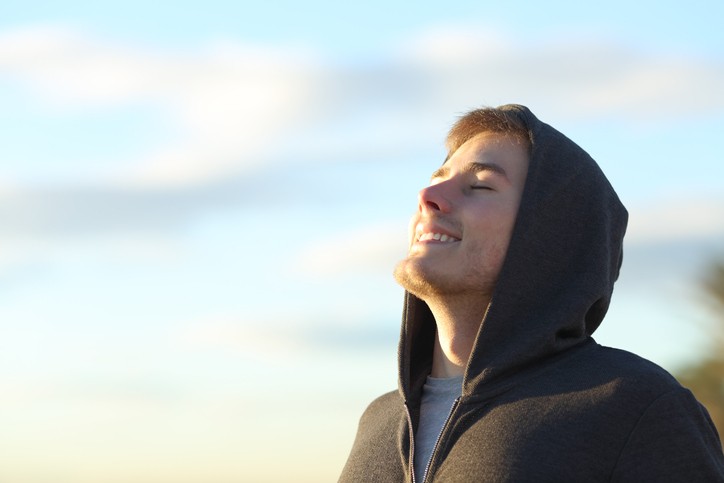 Happy man looking up