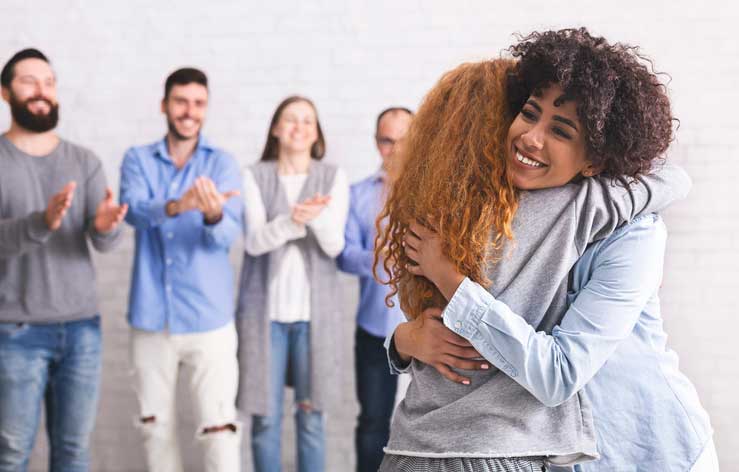 Two people hugging