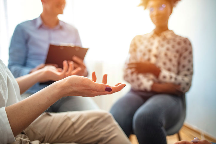 Person talking to group