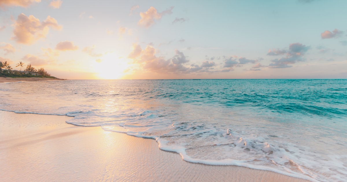 Calm sunset over the ocean representing peaceful recovery from alcohol use